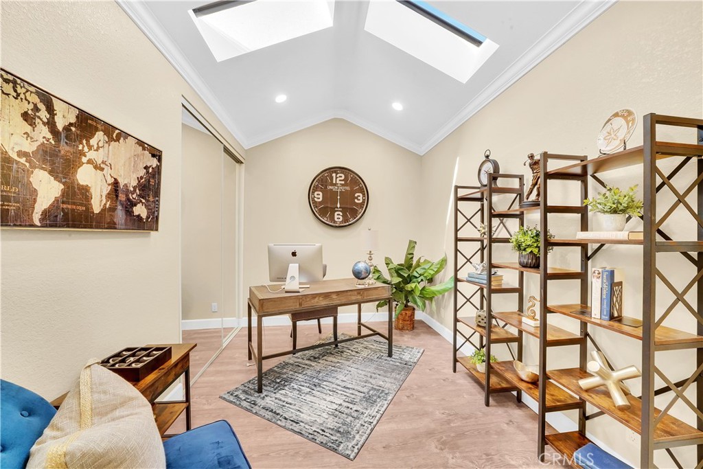 Modern Home Office with Skylights and Elegant Real Estate Decor