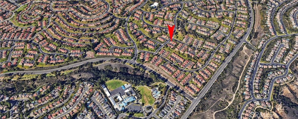 Aerial View of Suburban Neighborhood with Real Estate Listings Highlighted