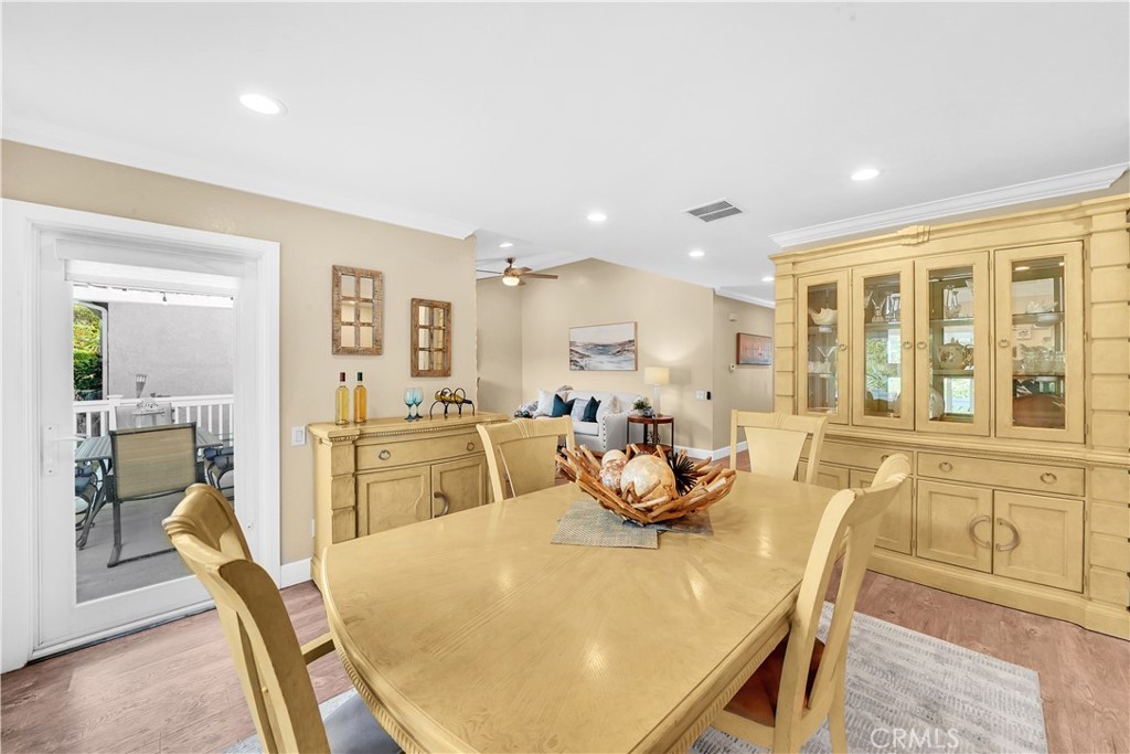Dining Room with Wooden Table and China Cabinet in Homes for Sale