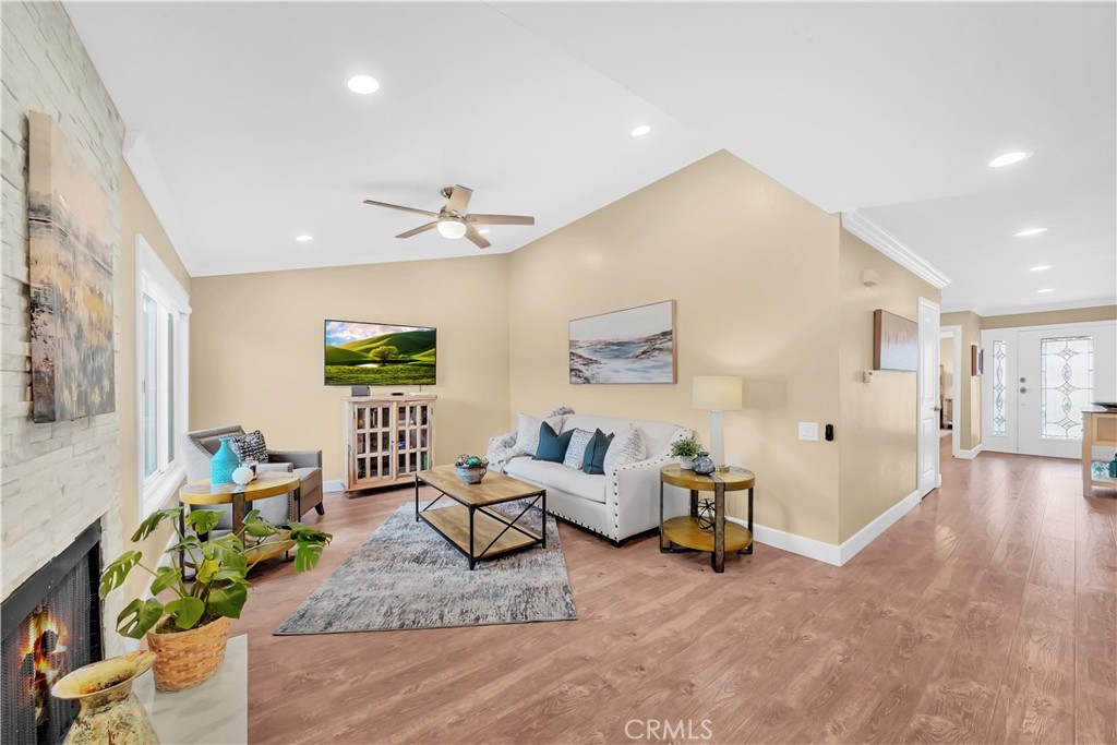 Spacious Living Room with Modern Decor and Wooden Flooring Real Estate Listing