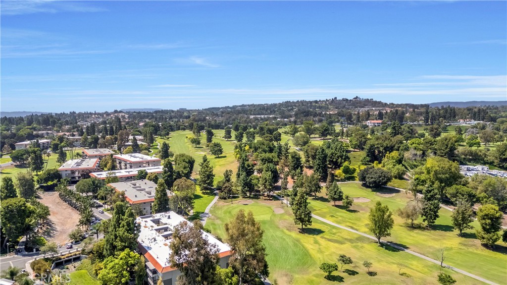 Aerial View of Residential Area and Green Golf Course Landscape
