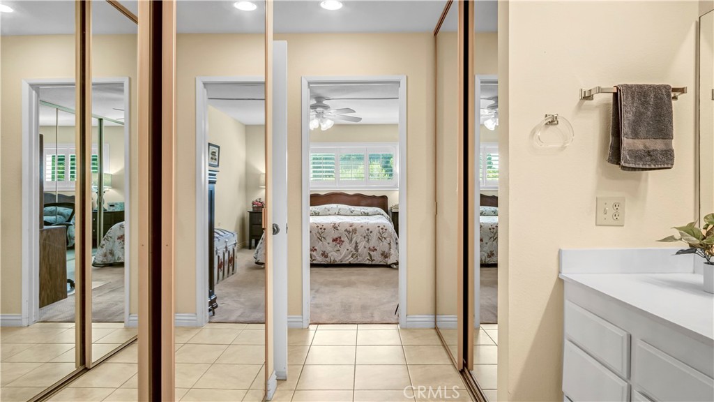 Bedroom with Mirrored Closet Doors and View of Cozy Real Estate Listing