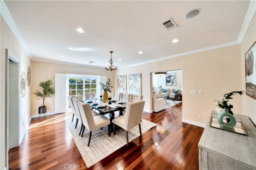 Spacious Dining Room in Modern Home with Elegant Hardwood Floors