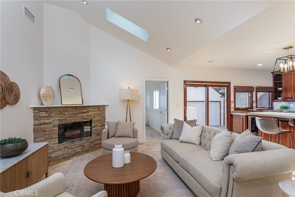 Spacious Living Room with Cozy Fireplace and Elegant Decor