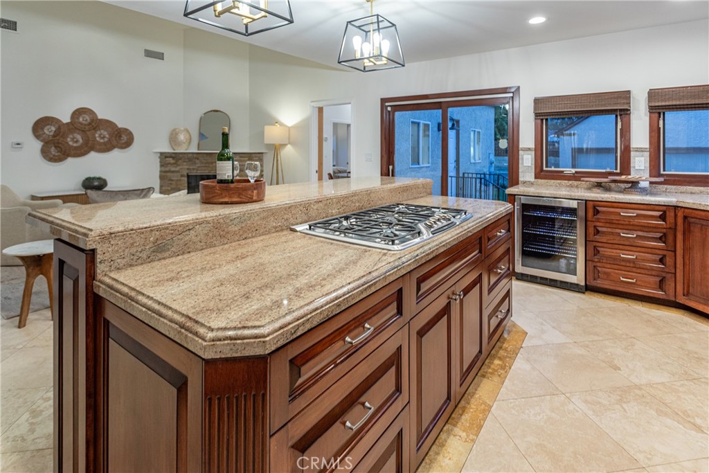 Spacious Kitchen with Granite Island and Modern Real Estate Features